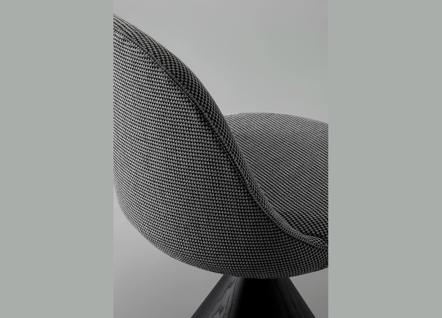 ROMBY chair by GamFratesi with sculptural upholstered silhouette