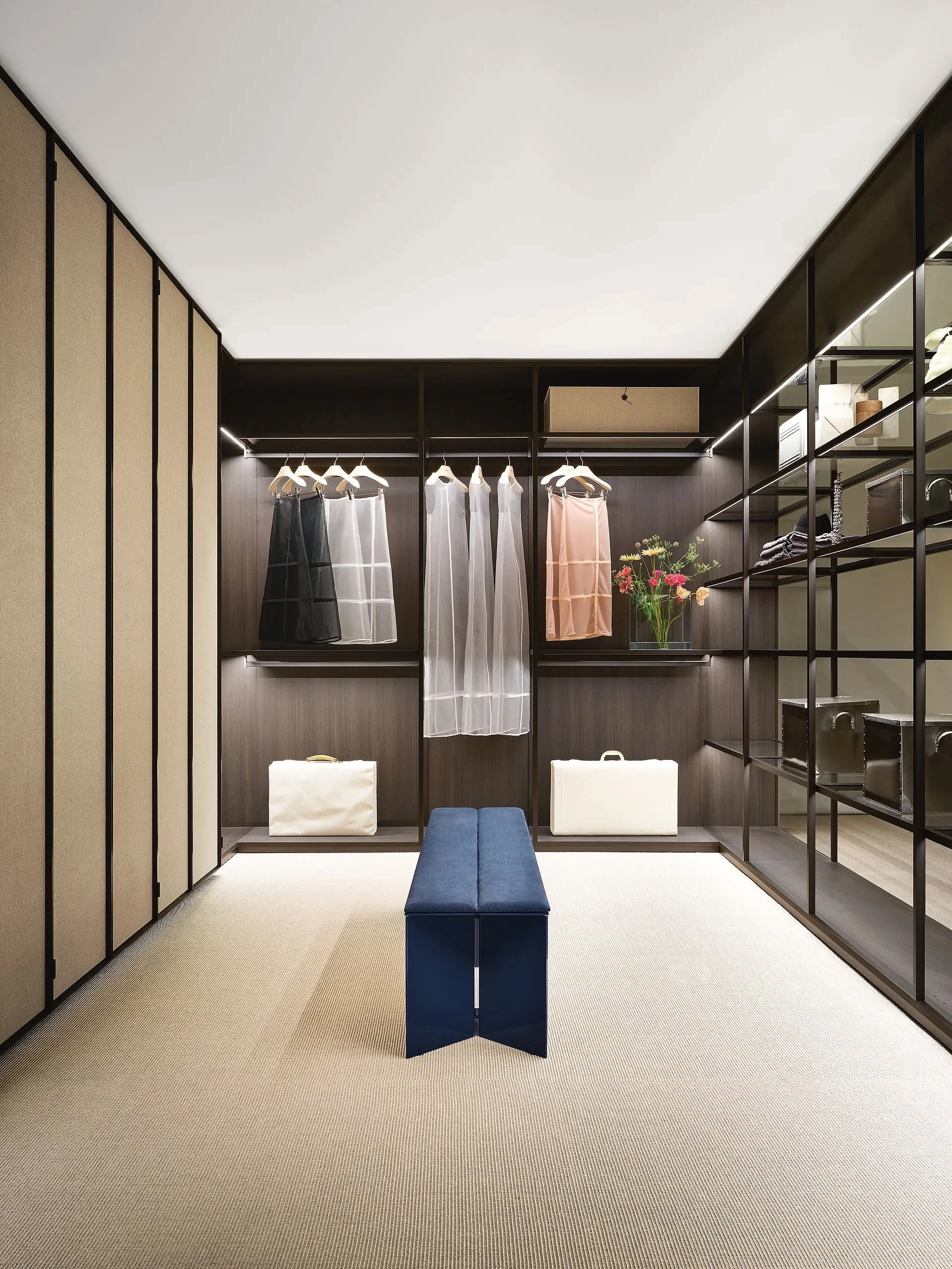 Modern Closets featuring refined Porro storage and wardrobe design