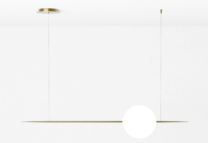 Ad-Astra floor lamp by Marco Lavit featuring a luminous sphere on a slender polished brass stem.