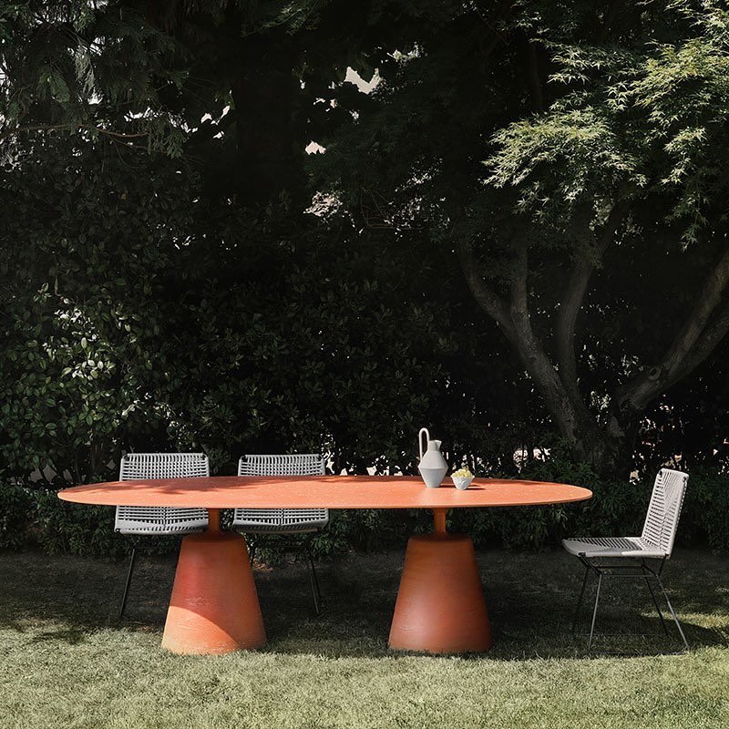 Family of indoor/outdoor tables supported by a concrete base. Various sized dining table, bistro table, and low tables available in multiple finishes including rock chip tops or wood tops. Available and on display @ GRAYE.

Designed by: @jm_massaud 
