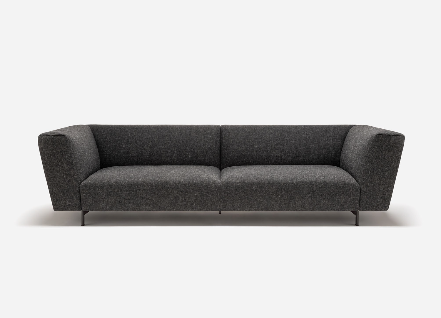 NEERA linear sofa with modular steel frame and upholstered structure