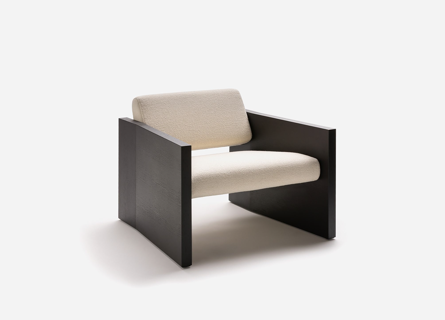 Haven Chair with padded structure and softly contoured armchair design