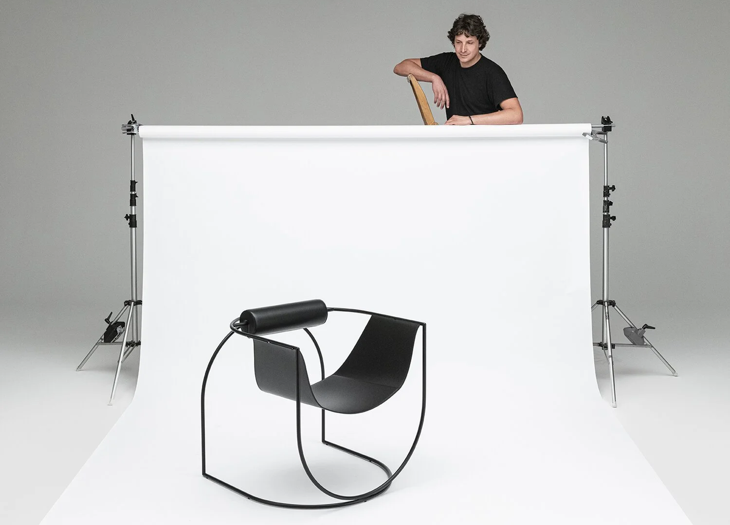 Lemni Chair by Marco Lavit with suspended leather seating design
