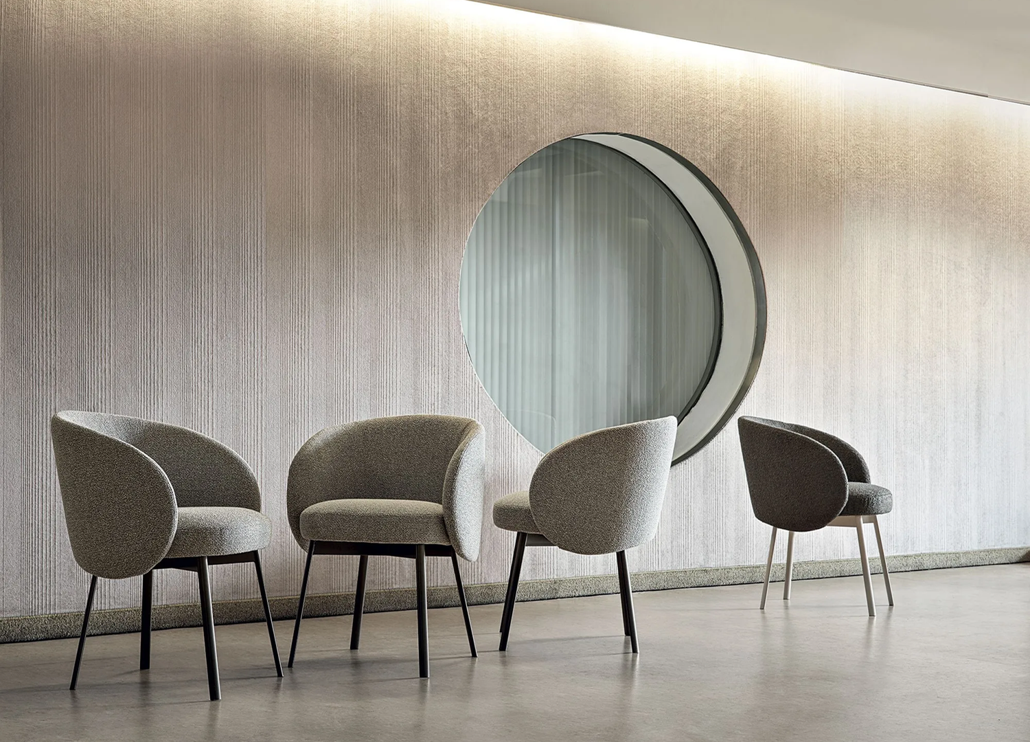Hug Chair with embracing curved backrest and upholstered dining design