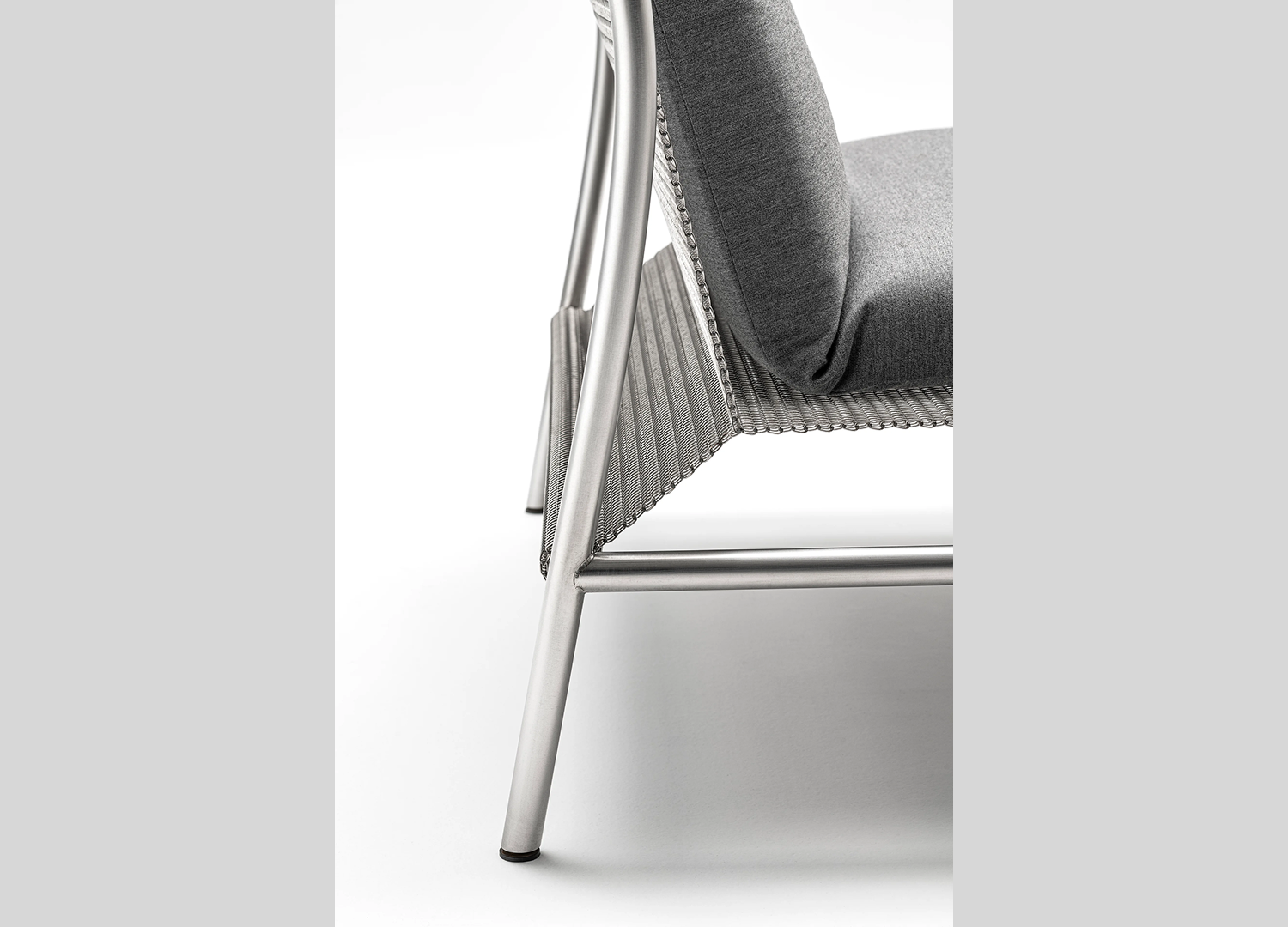 Hi Tech Chair by Piero Lissoni with sculptural metal frame