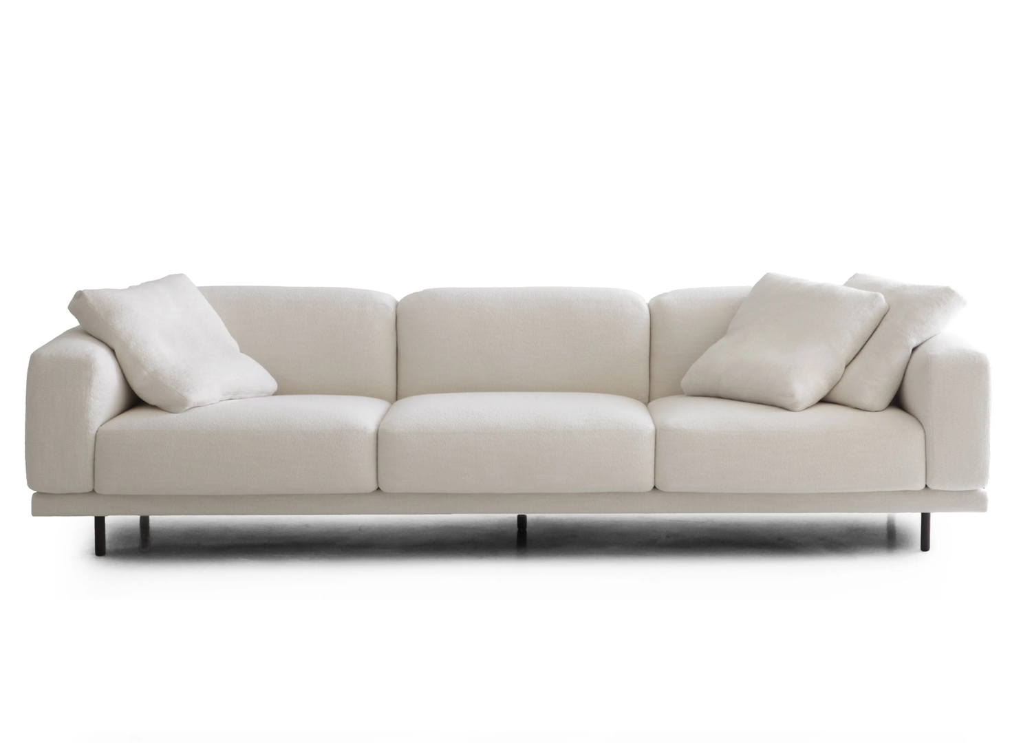 Biscuit Sofa designed by Piero Lissoni with slender wooden covered feet