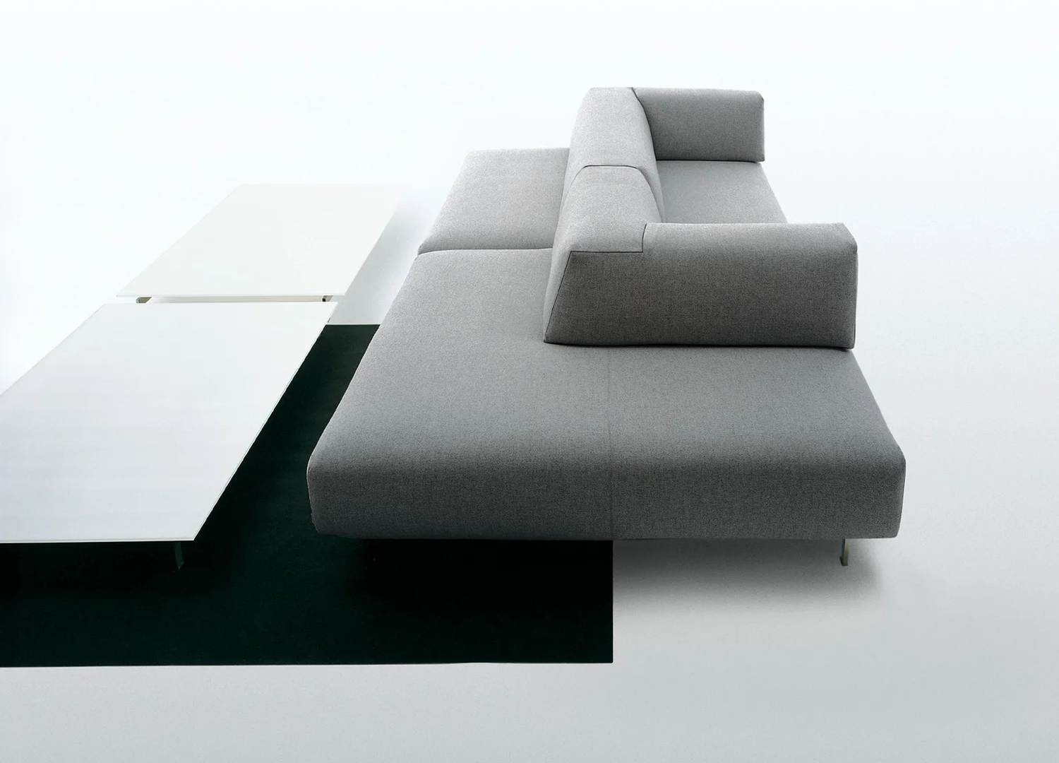 Metro Sofa by Piero Lissoni with sculptural curved form