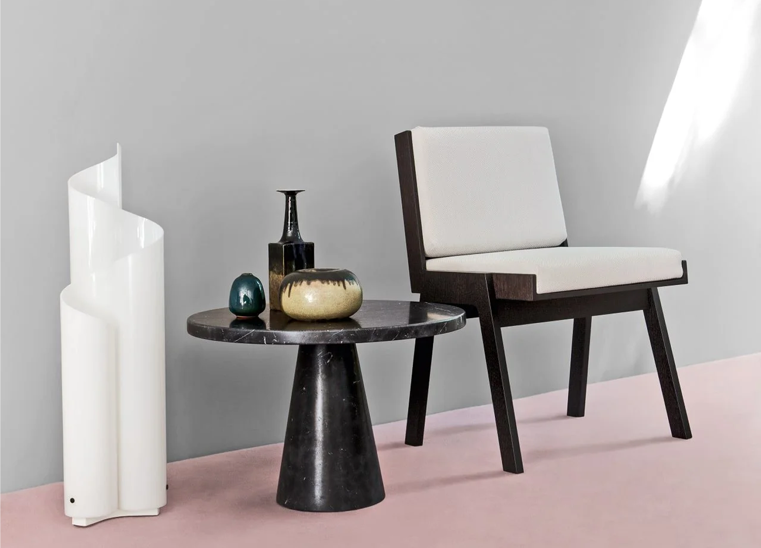 CLUB 44 sculptural armchair with distinctive inverted V-shaped leg