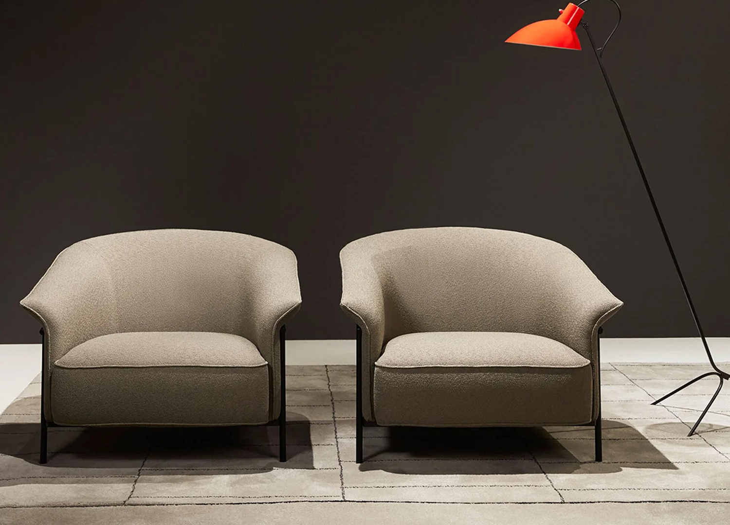 Kite Chair with sculptural form and contemporary armchair design
