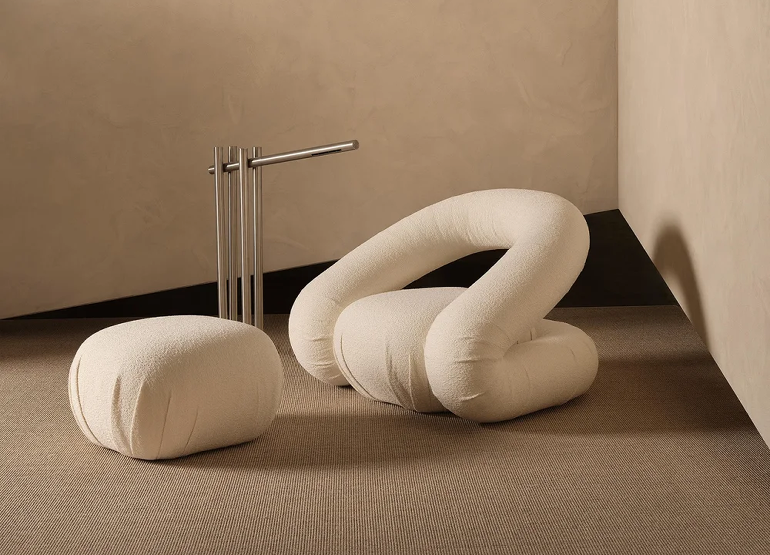 Peggy Chair with curvy enveloping form and upholstered seating