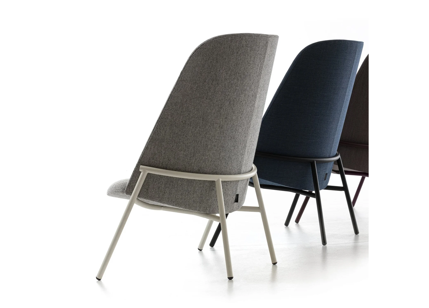 PHAR LAP contemporary high back armchair with tubular steel structure