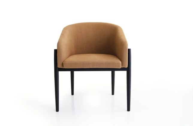 Brezza dining chair with camel-colored upholstered bucket seat and curved backrest on a black wood frame with tapered legs, shown on a white background.