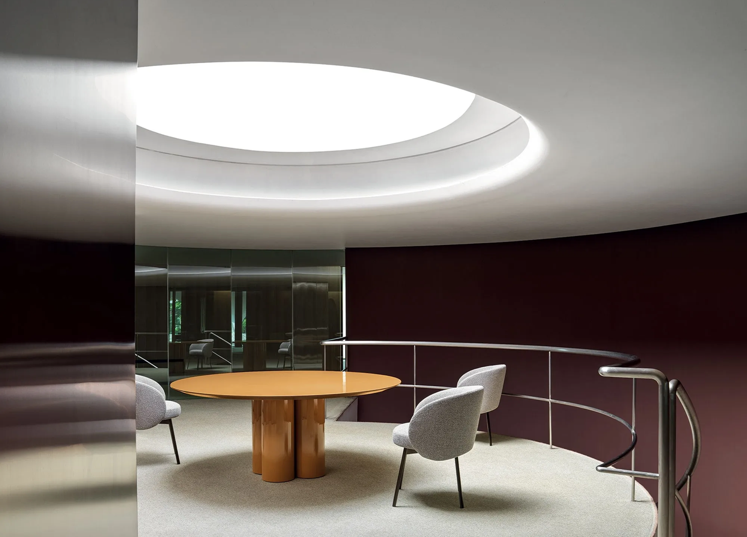 Hug Chair with fixed leather or fabric upholstery and modern silhouette