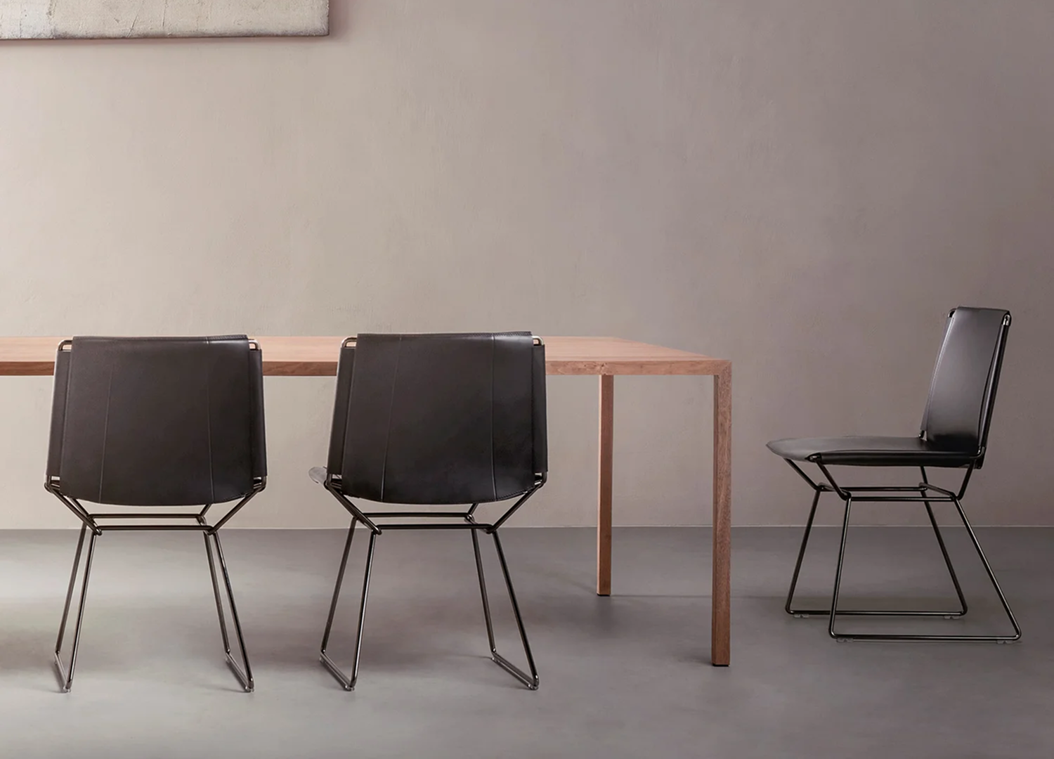 NEIL modern dining chair with tailored saddle leather seat and back