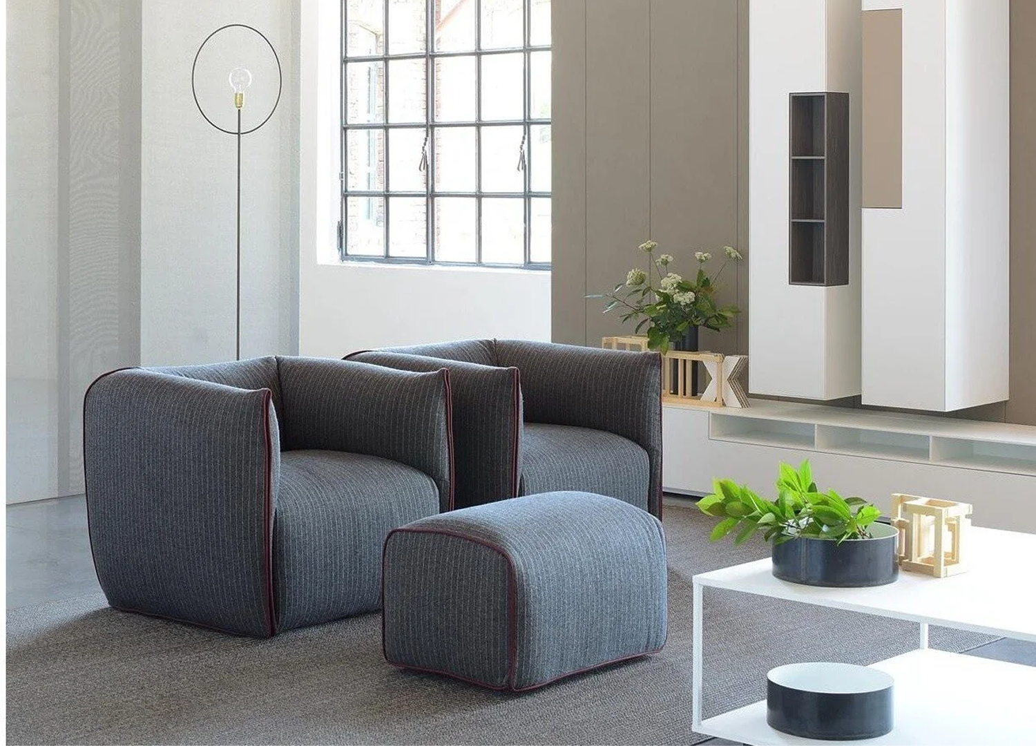 Mia Chair with minimalist profile and refined fabric upholstery
