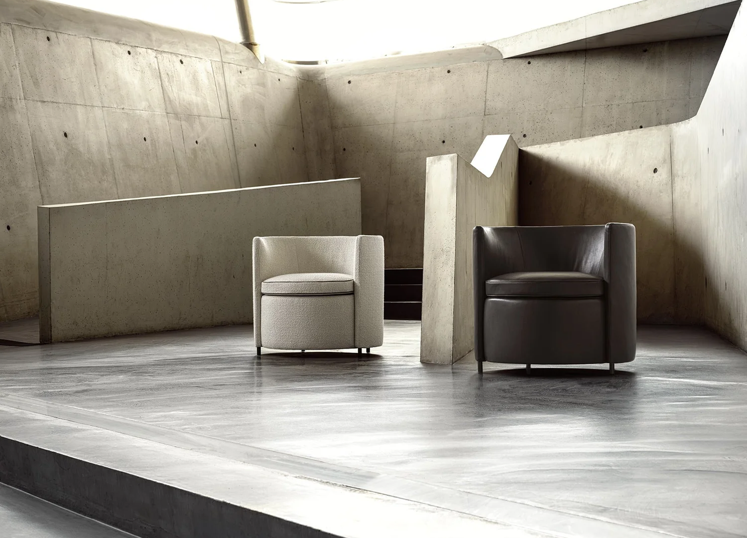Lou Chair with soft contours and contemporary tub armchair design