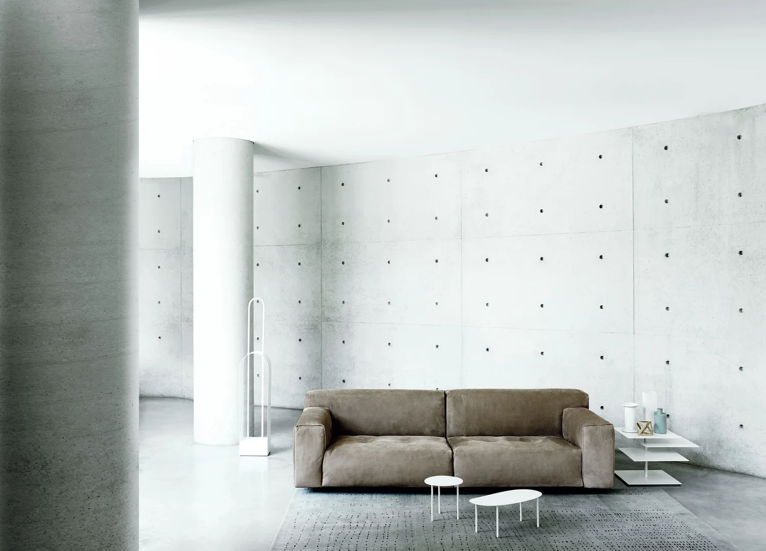 Softwall modular upholstered sofa with soft architectural silhouette