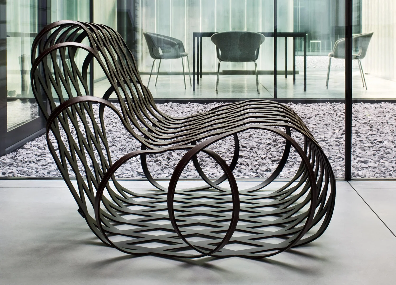 Aria Chair by Antonio Rodriguez with sculpted lounge seating