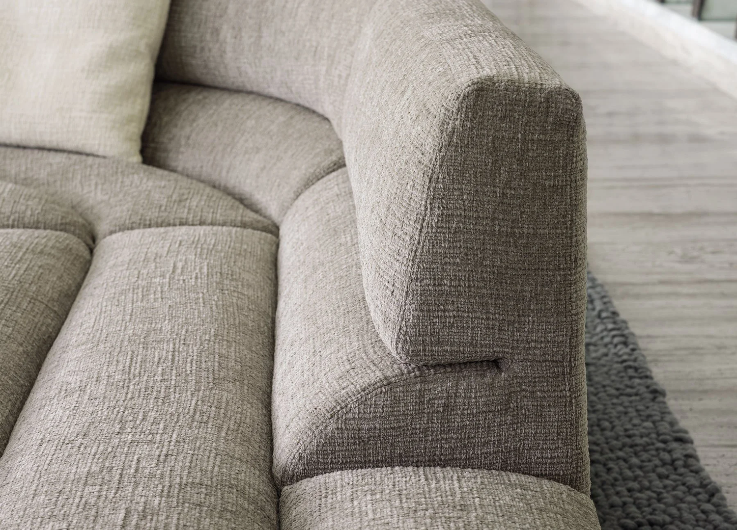 PHIL modern sofa with sinuous geometry and refined proportions