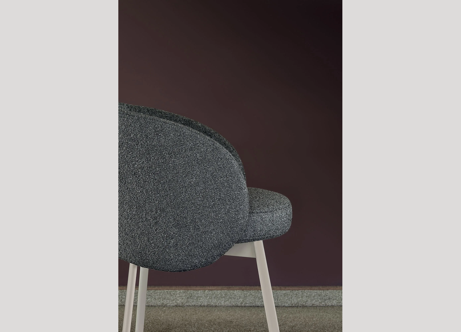 Hug Chair contemporary dining seat with cushioned upholstery