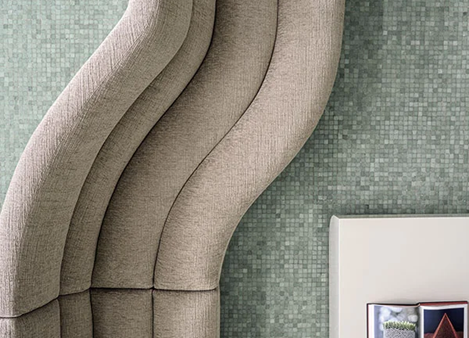 PHIL contemporary designer sofa with sculptural curved profile
