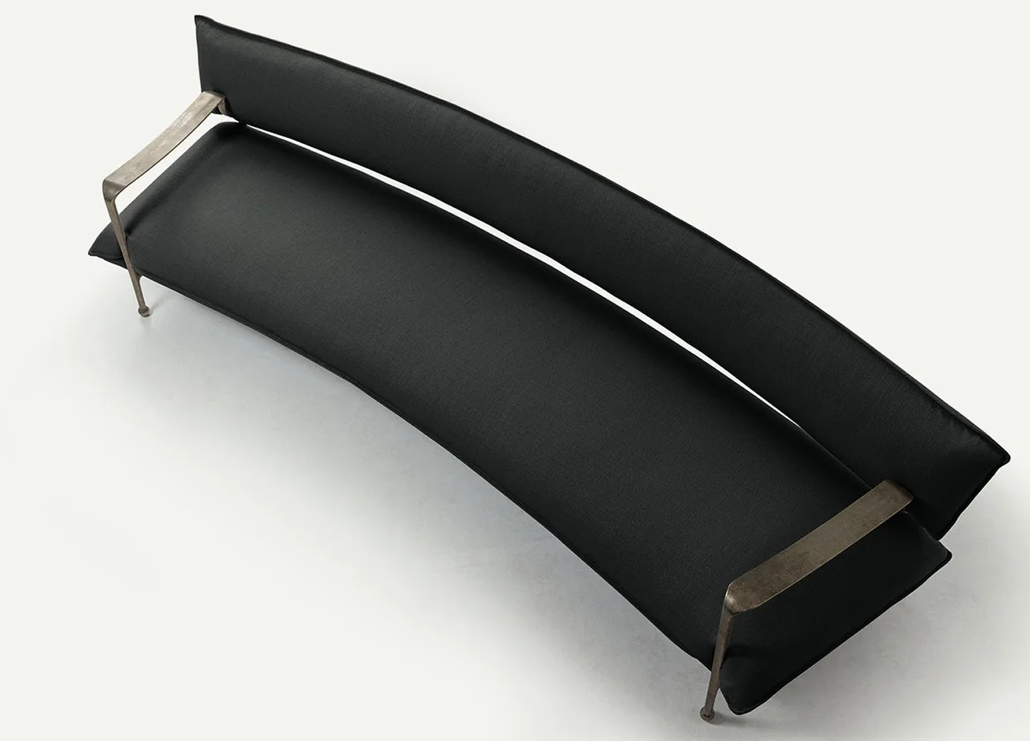 RIACE sculptural sofa with slender white bronze frame and upholstered seat
