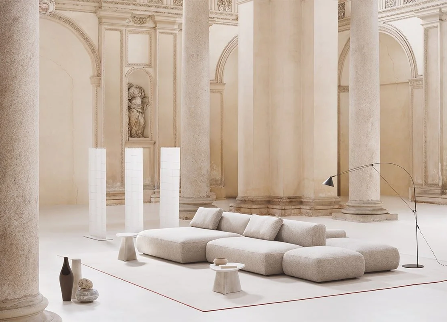 Elegant Cosy Island sofa designed around sleek profile for upscale residences.