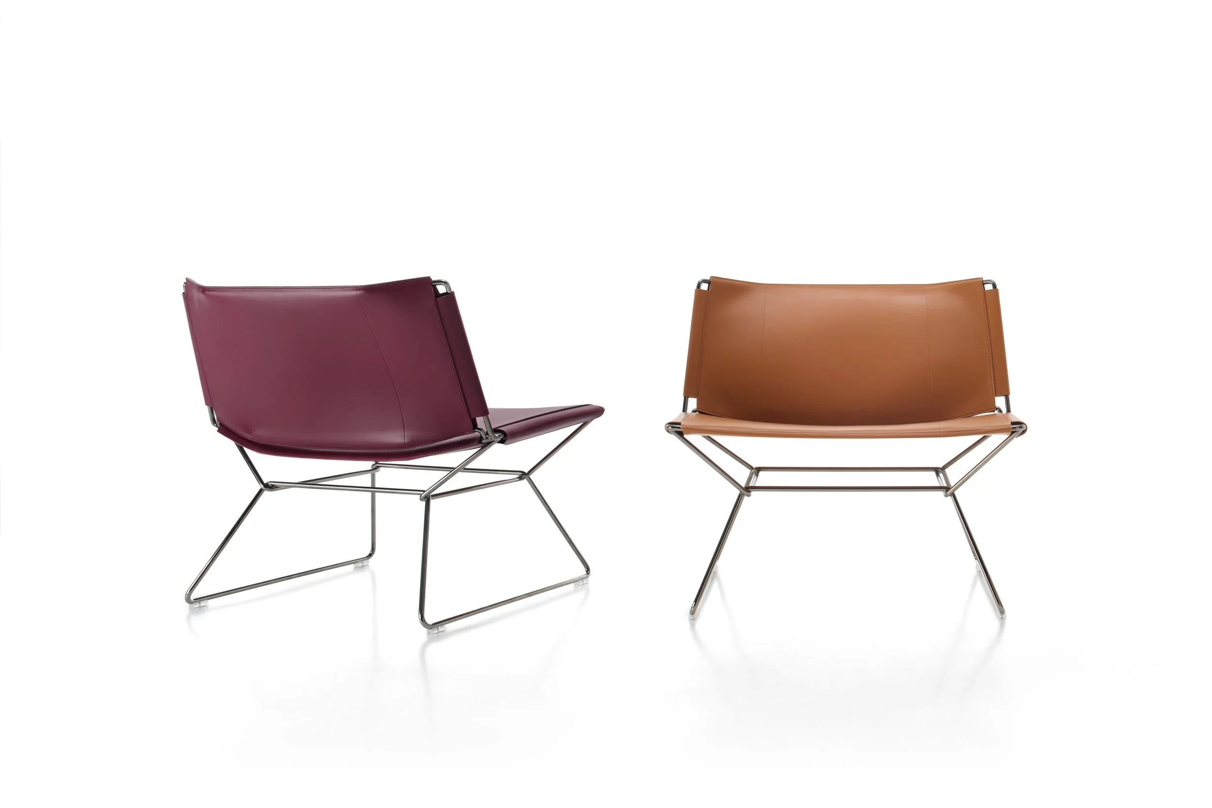 Neil Chair with sleek profile and refined contemporary lounge design