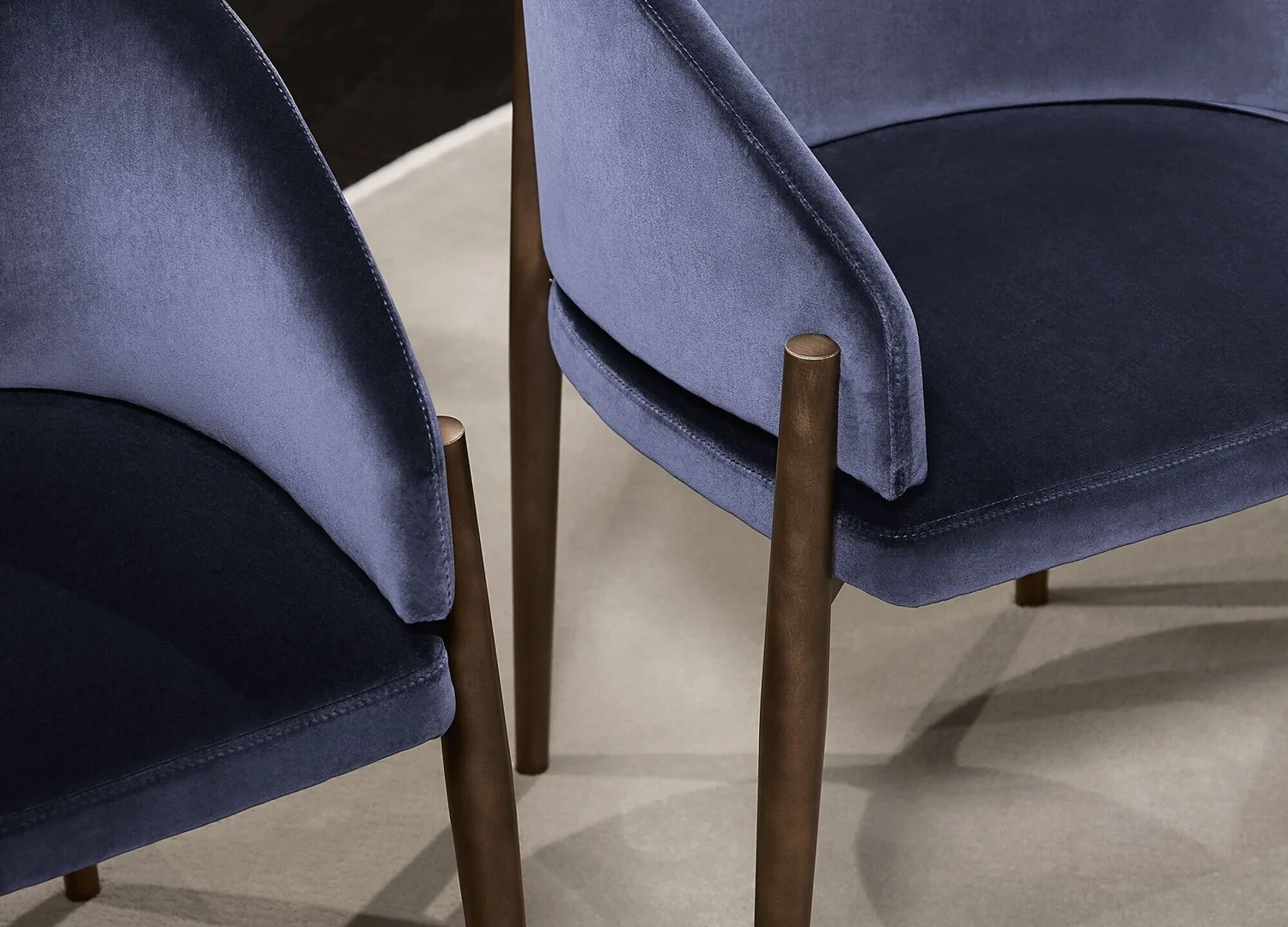 Frank Dining Chair with refined metal legs and comfortable upholstered seat