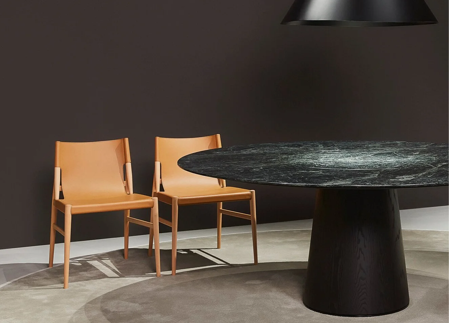 VOYAGE dining chair with maple frame and saddle leather sling seat