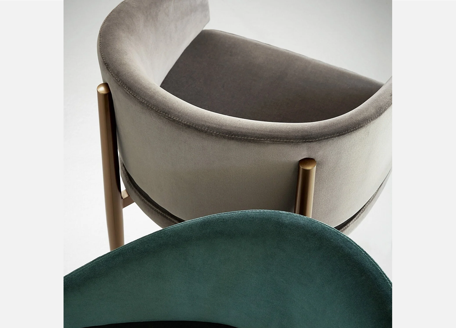 Frank Dining Chair with iron or brass legs and contemporary upholstery