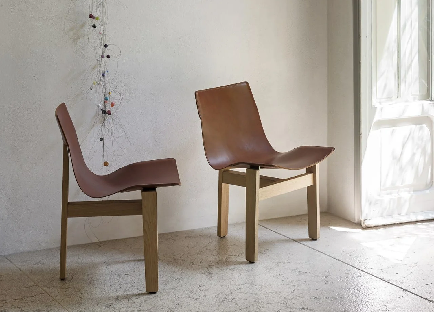 TRE 3 contemporary dining seating with customizable finishes