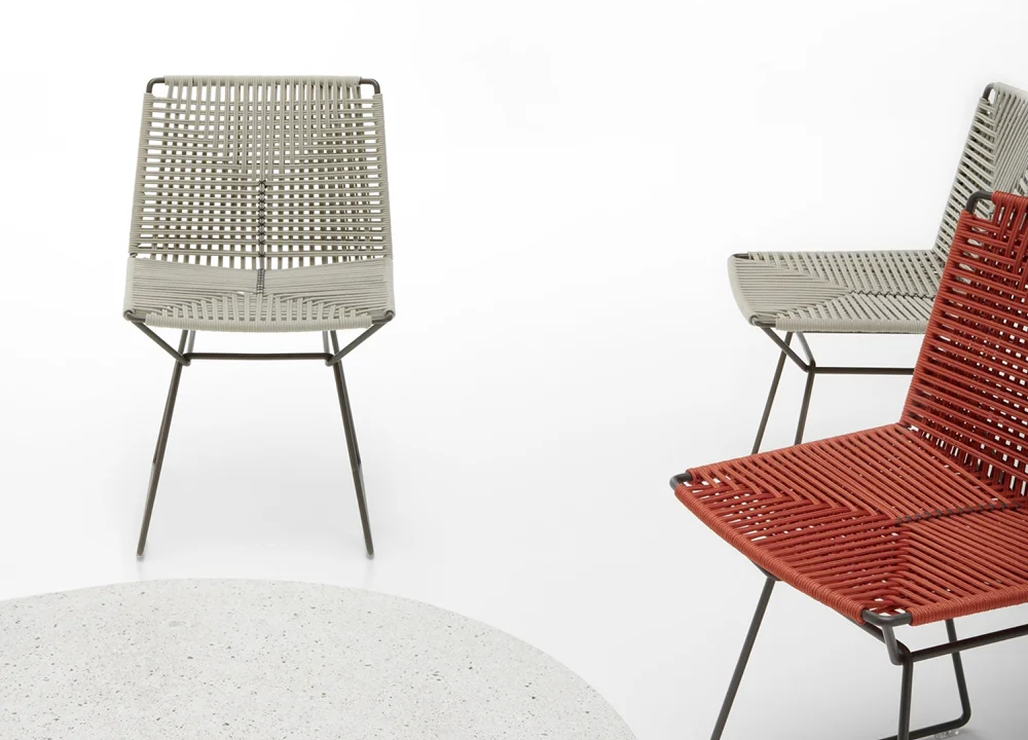 NEIL TWIST dining chair with braided rope seating and steel base