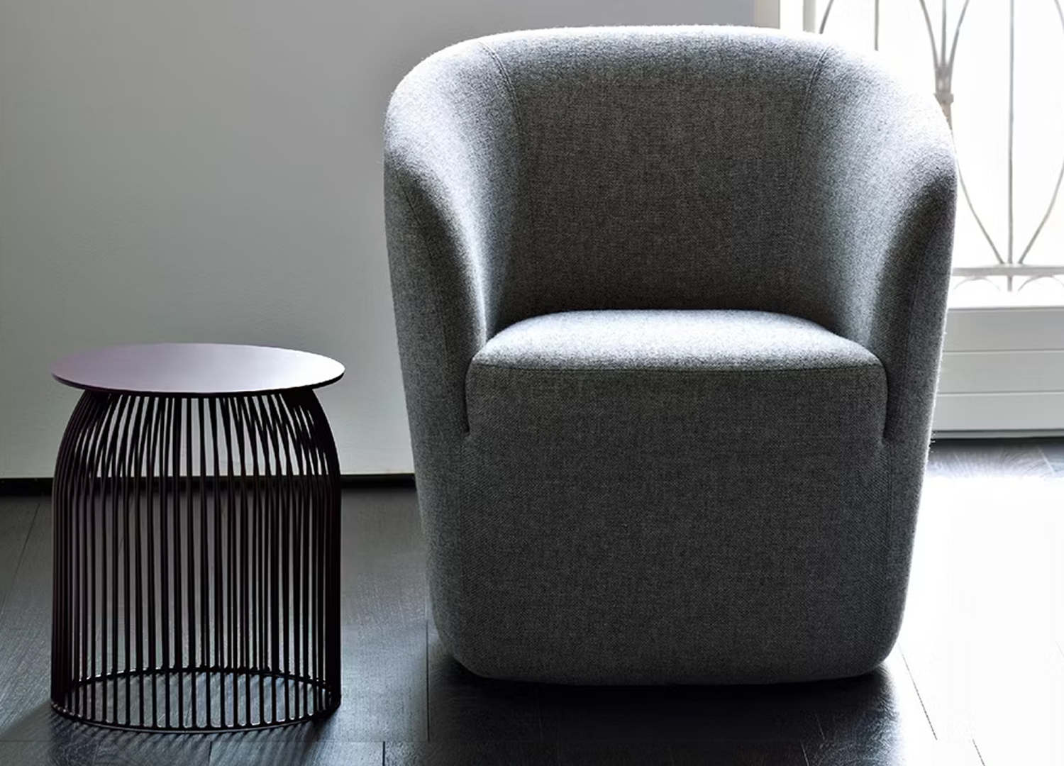 DEP Italian lounge chair with soft rounded upholstery and bold profile
