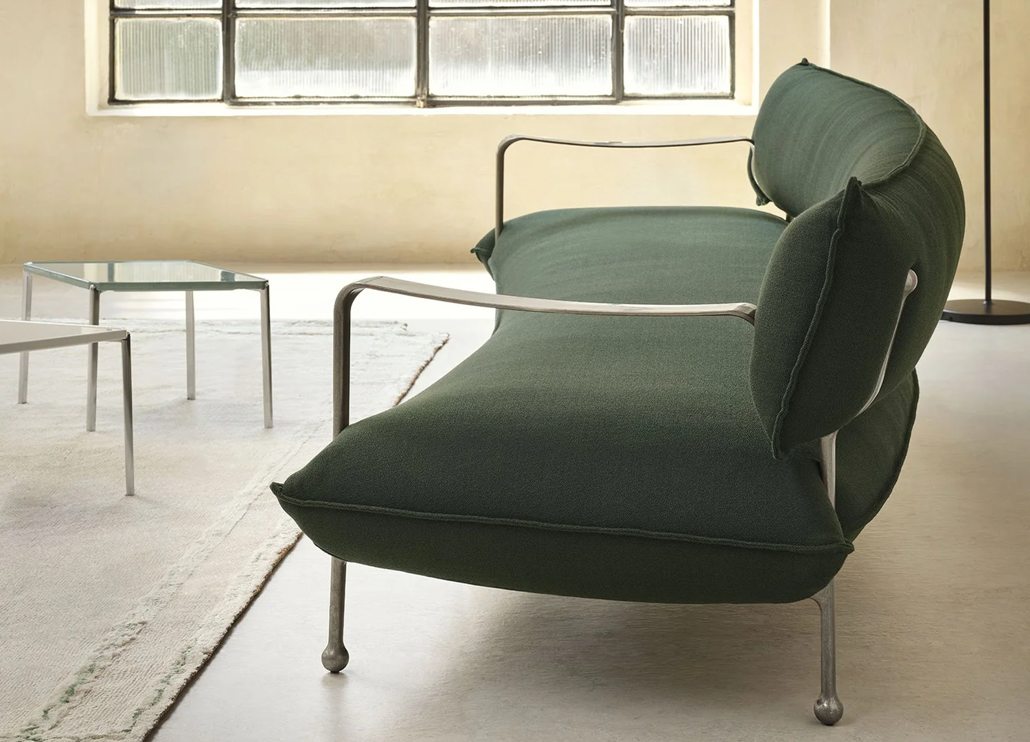 RIACE modern Italian sofa with sculptural upholstered form