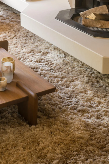 Koko rug in a retro shaggy weave of mohair and New Zealand wool beneath a coffee table.