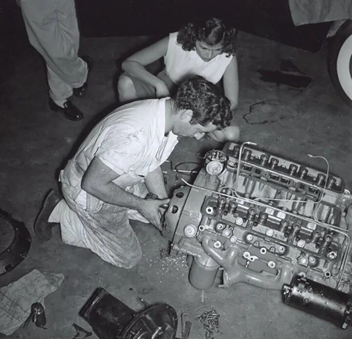 Max and Ina work on the Buick