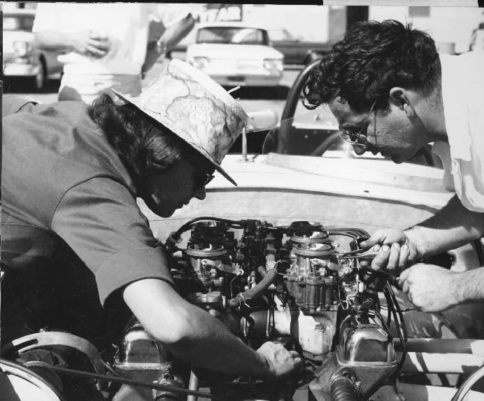 Max and Ina work on the Buick