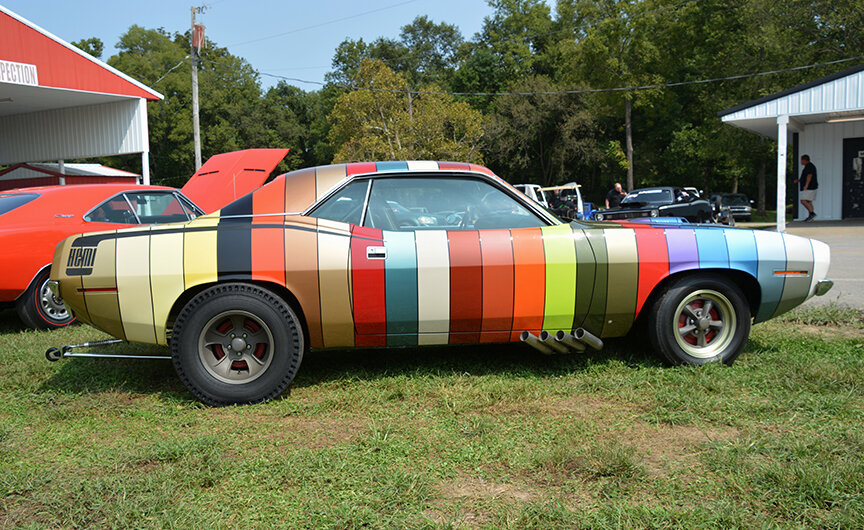    he Plymouth Rapid Transit System Paint Stripe car was brought to life by Tim Welborn.   