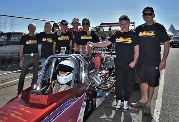 The team, L-R: Richard Parish, Ella Chapman, (behind) Julie Veale, Bill Mears, Bertie Hopkinson, Damian Burke, Mark Evans, Gregory Veale, Robin Read in the car. Photo Andy Willsheer