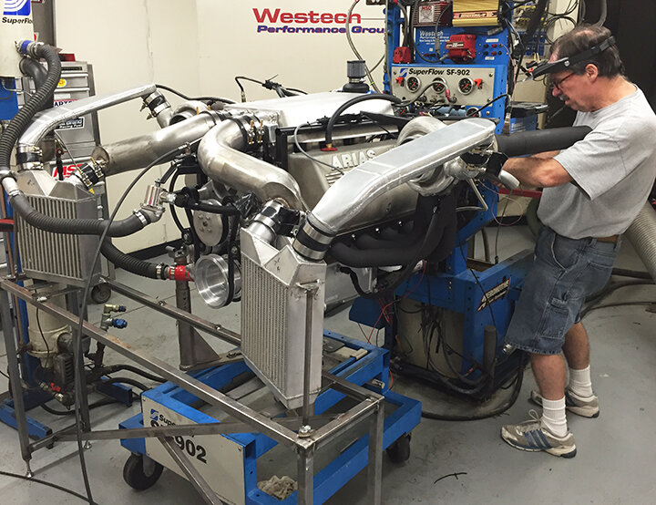Paul Hattrup inspects engine on Westech dyno