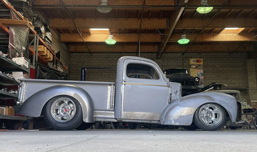 The bed and rear fenders are re-worked '46 Chevy items