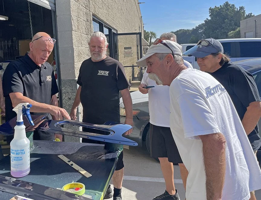 Mick Jenkins and Larry pick a Ferrari blue