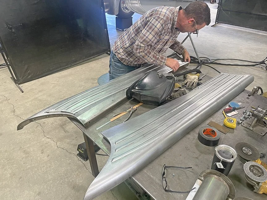 Jeff Johnson welds in the running boards inserts