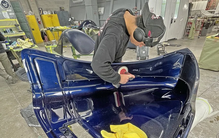  Diego polishes the underside of the hood