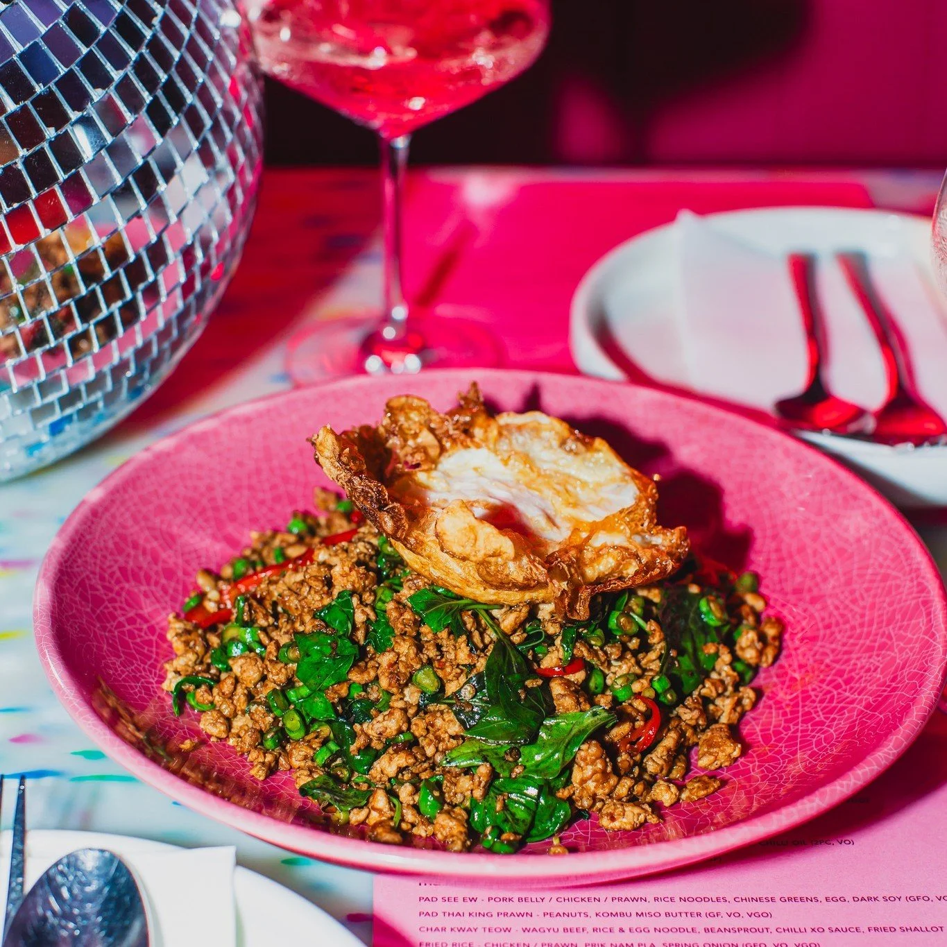 That crispy edged fried egg over spicy, fragrant minced meat and basil hits every single time. Pop the yolk, mix it up, and grab a cocktail under the disco ball.

Snag your spot for dinner:https://www.sevenrooms.com/.../reservations/create/search

#p
