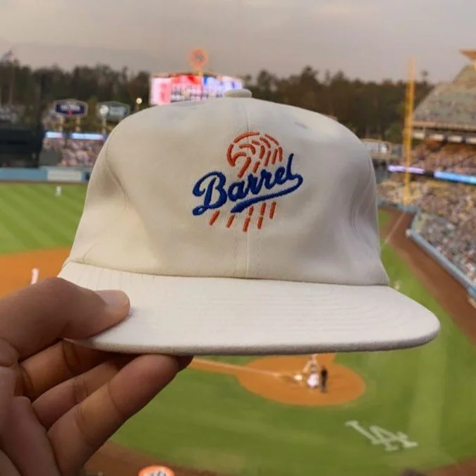 Meta magic.
@almondsurfboards barrel cap made it to a Dodgers game!  Thanks @zach.so for making this a thing 👌🏼