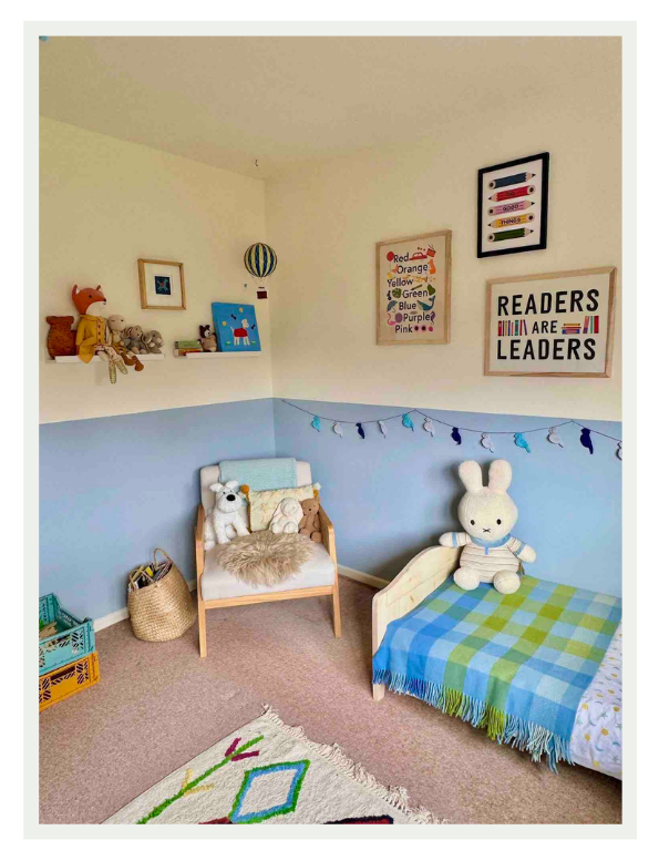 Colourful feature wall in a child's bedroom adding personality without overwhelming the space.