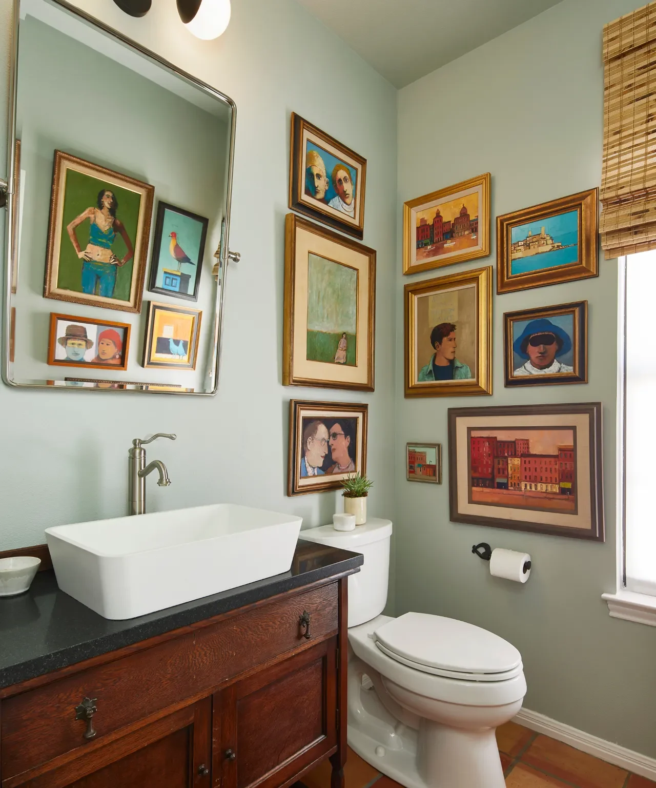 Interior design gallery wall with artwork and meaningful personal objects arranged together