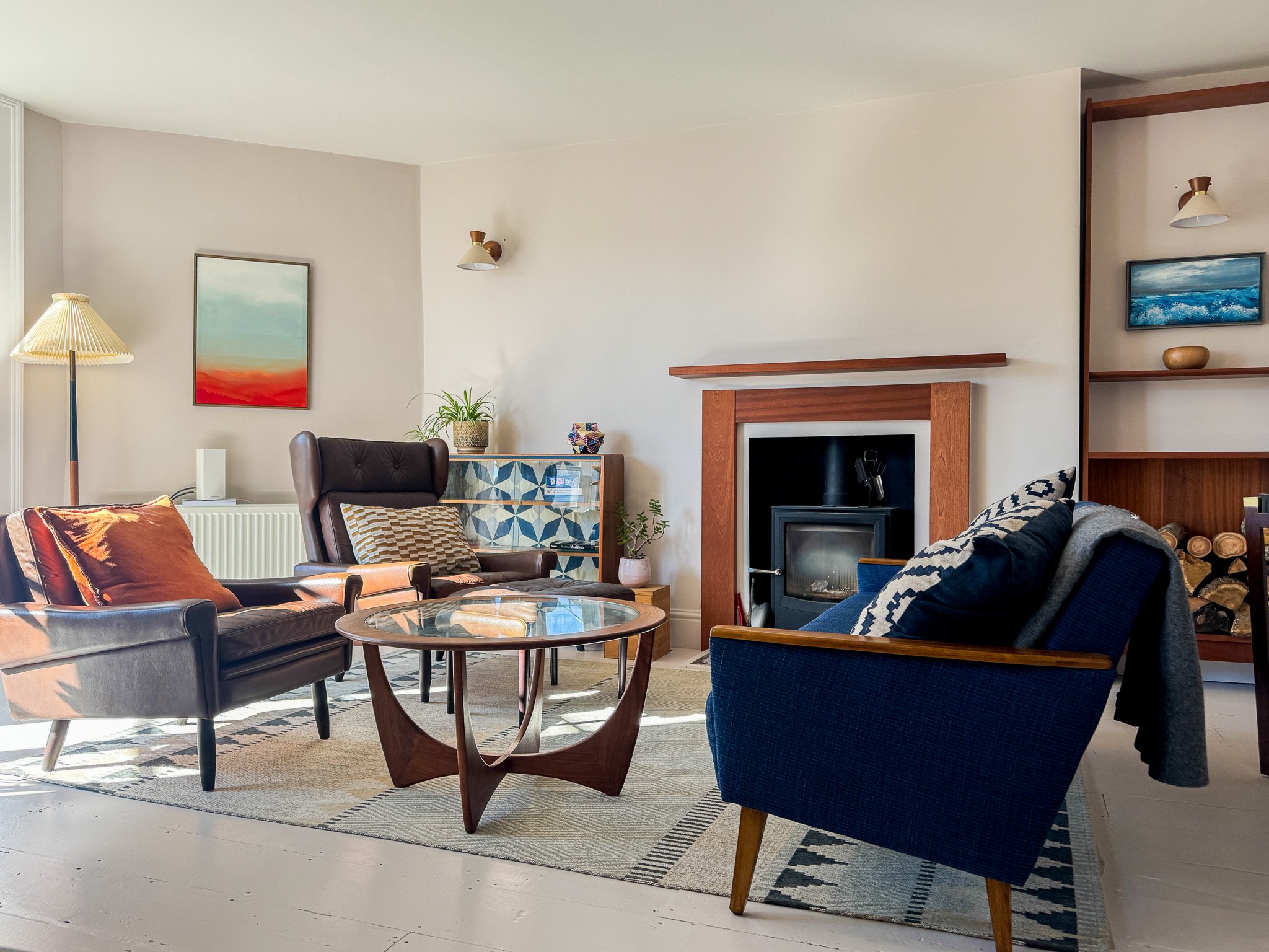 Victorian living room with mid-century furniture and rich wall colours in Bristol